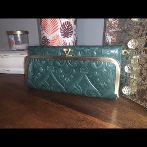 NWOT embossed Green HOBO Rachel wallet.